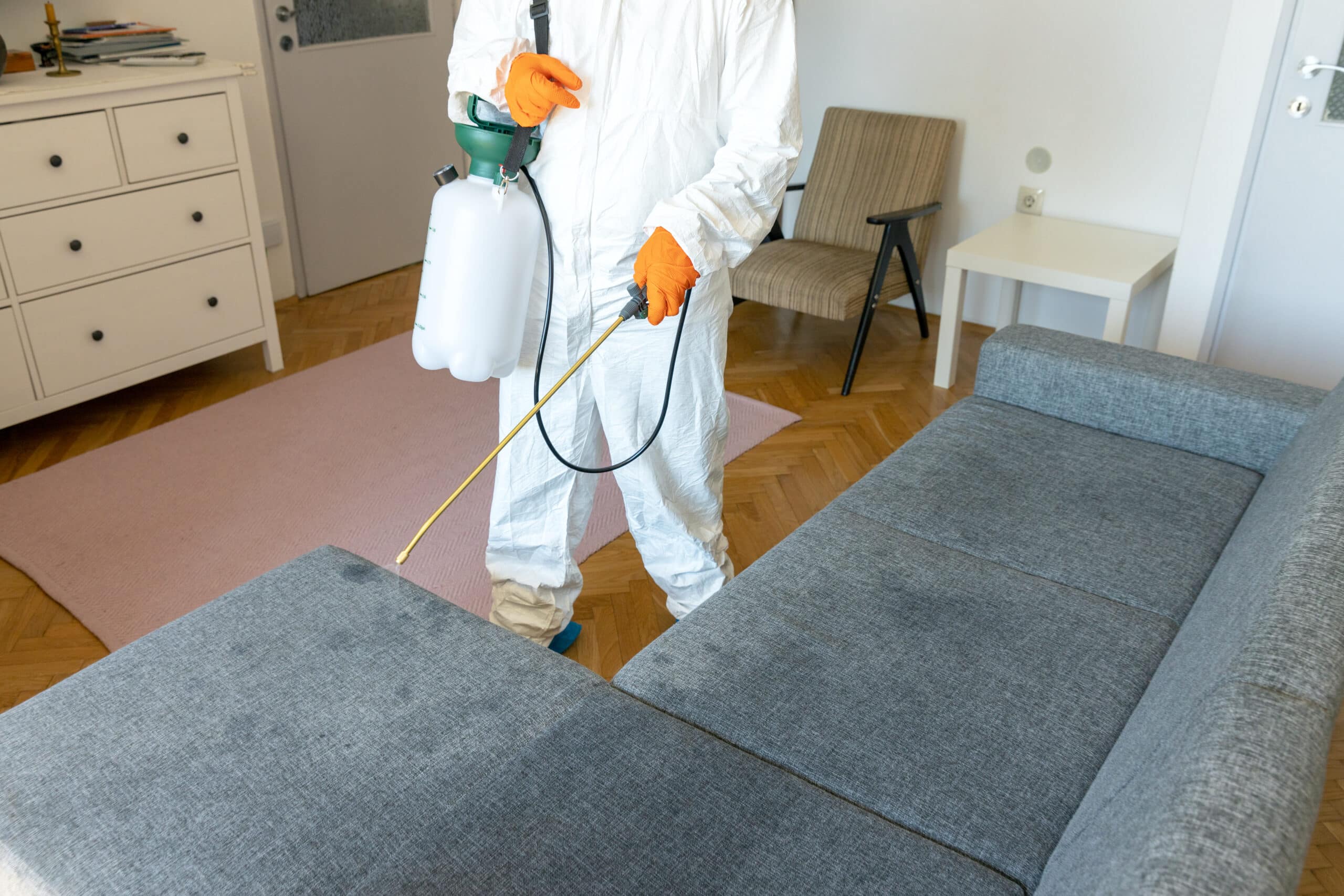 Pesticon technician performing residential pest control process step-by-step